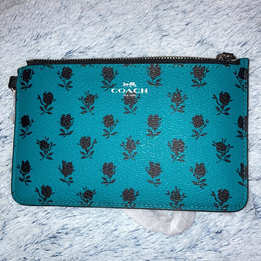 NEW. COACH small wristlet. Turquoise with black roses. NWT